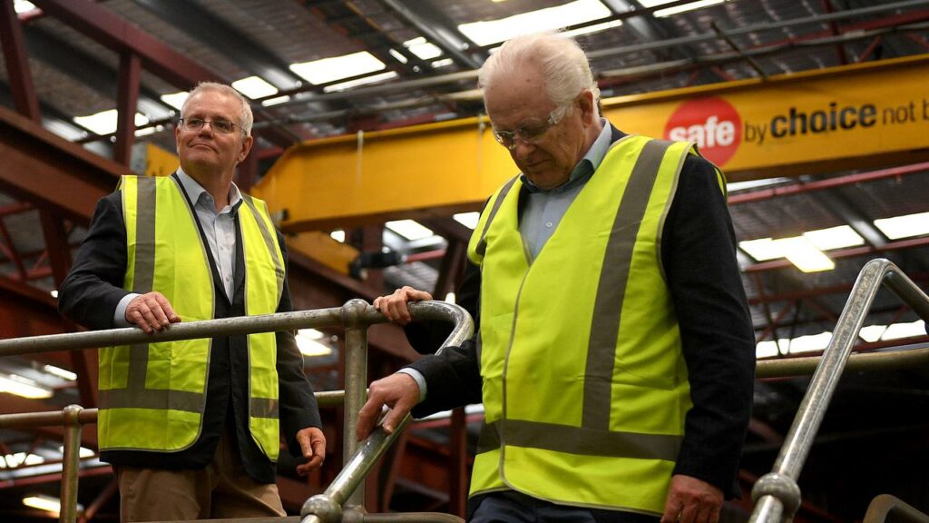Prime Minister Scott Morrison (left) during a visit to the Crossmuller factory in Somersby, NSW.