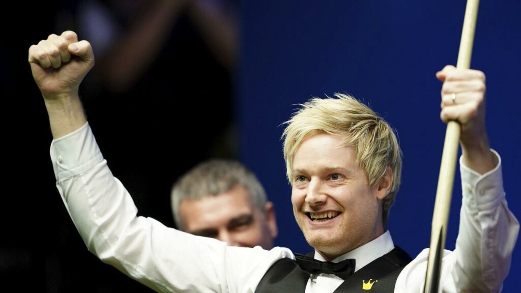 Neil Robertson has celebrated a rare maximum break at the world snooker championship in Sheffield.
