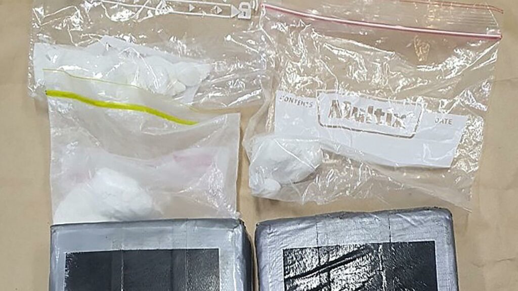 Police allegedly found more than 4kg each of methamphetamine and cocaine in the vehicle.