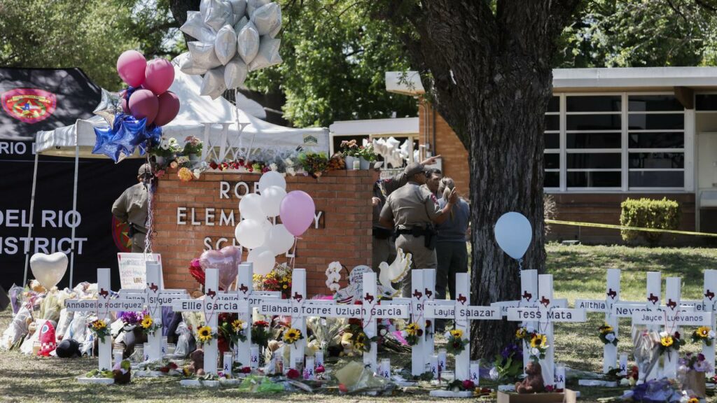 Nineteen children and two teachers were gunned down at a Texas school as police waited outside.