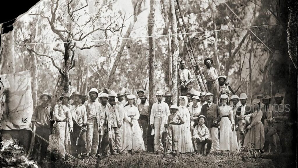 The first telegraph pole in Darwin being planted in 1870. (State Library of South Australia)
