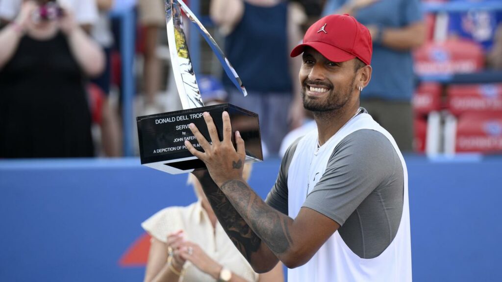 Nick Kyrgios celebrates winning his seventh ATP title with victory in the Washington Open final.
