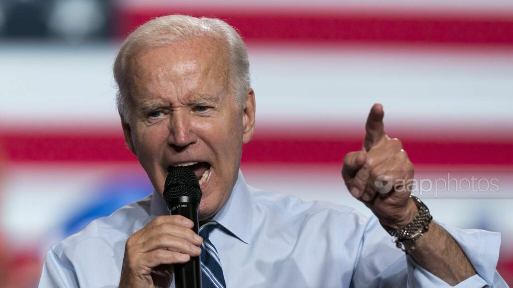 Donald Trump and his allies had chosen hate and division, President Joe Biden told supporters. (AP PHOTO)
