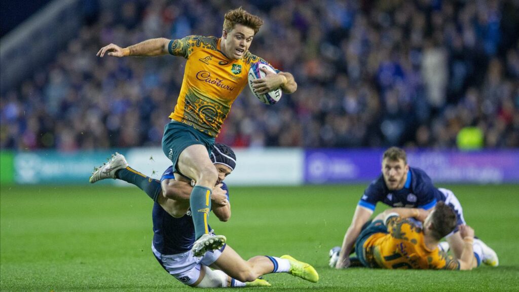 Australia’s Andrew Kellaway tackled by Scotland’s Darcy Graham in the Wallabies’ narrow win.