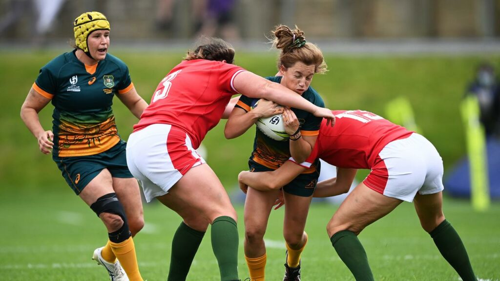 Two converted penalties from Lori Cramer (3-r) proved the difference as the Wallaroos beat Wales.