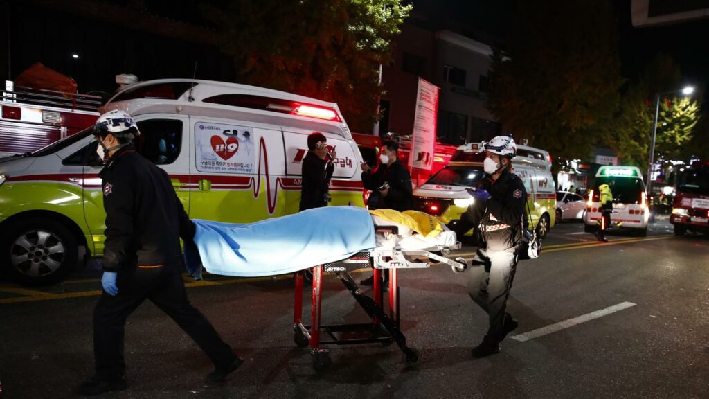 Australians in Seoul have been urged to contact their families, after a deadly stampede.