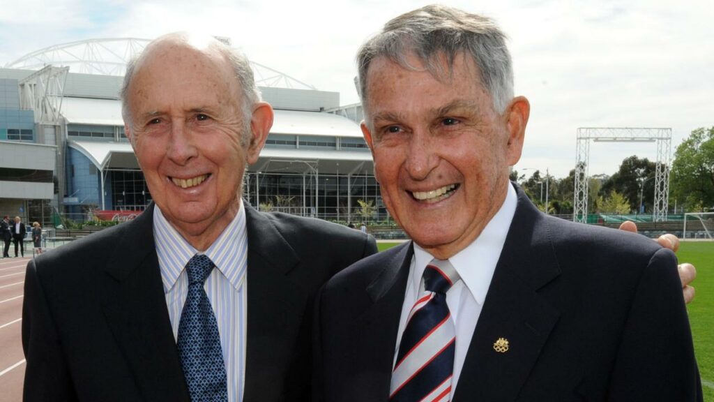 John Landy (L) and Ron Clarke are linked forever by Landy’s sportsmanship in 1956.