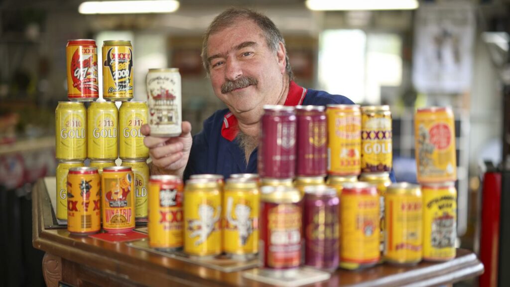 The walls of Paul Nash’s Brisbane “man cave” are adorned with about 200 collectible beer cans,