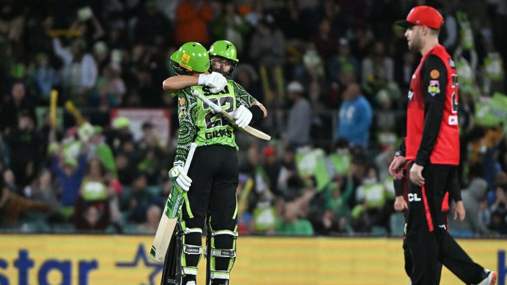 Matthew Gilkes and Alex Ross celebrate steering the Thunder to a big BBL win over the Renegades.
