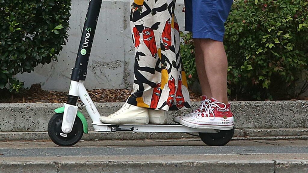 Electric scooter riders in Queensland can be penalised $143 for not wearing a helmet or “doubling”.