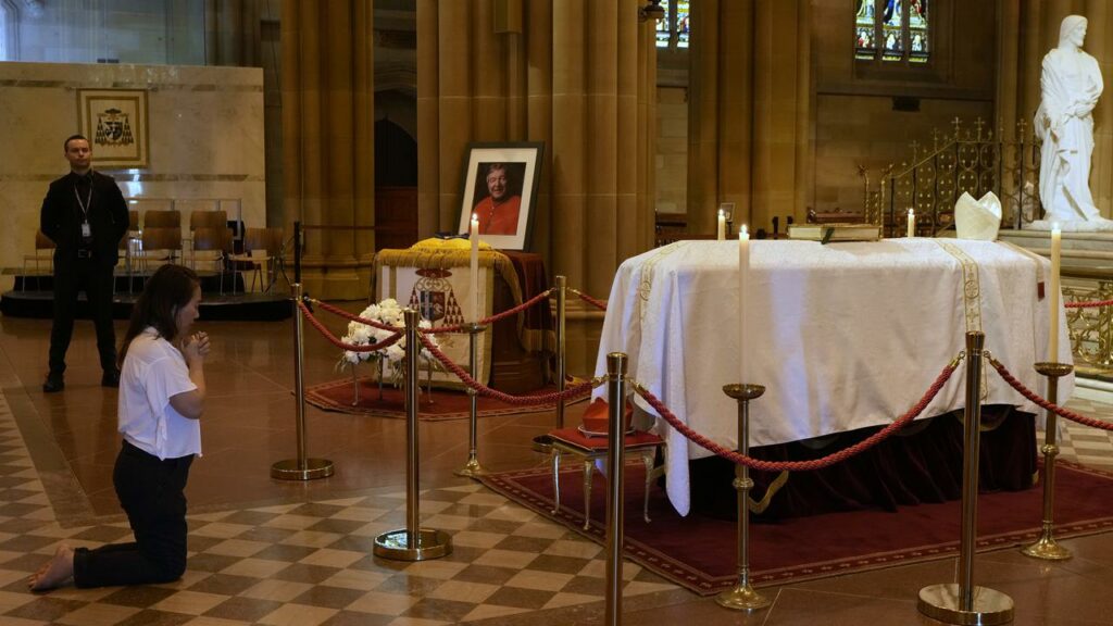 Cardinal George Pell’s coffin is lying in state ahead of his funeral mass at St Mary’s Cathedral.

