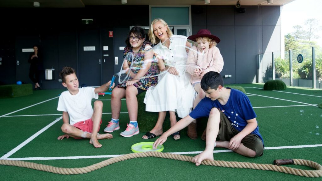 Sarah Murdoch takes part in the launch of a new toolkit to help children after natural disasters.
