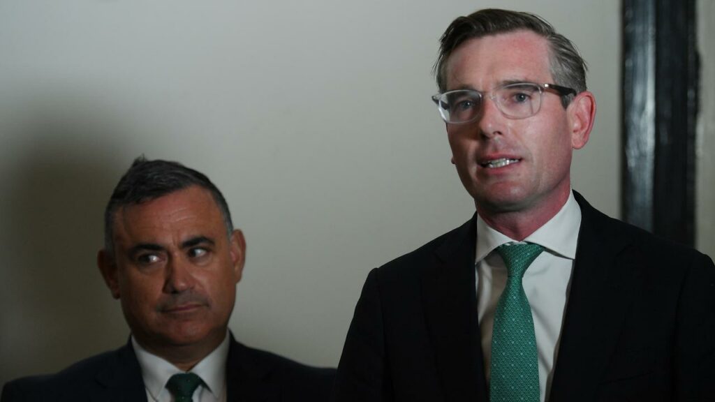 Dominic Perrottet (right) is accused of impeding a probe into trade roles including John Barilaro’s.