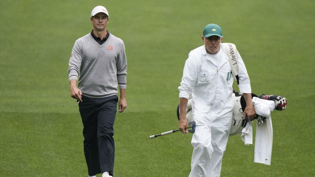 Adam Scott walks up the seventh fairway during practice at Augusta, where he triumphed in 2013.