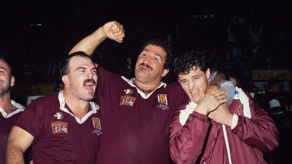 Former Maroon Sam Backo (centre) is “improving on a daily basis” following his April 1 heart attack.