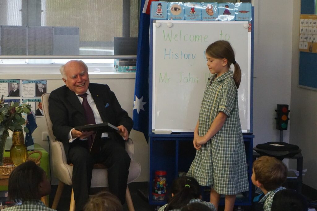Former PM John Howard visits Pallara State School.