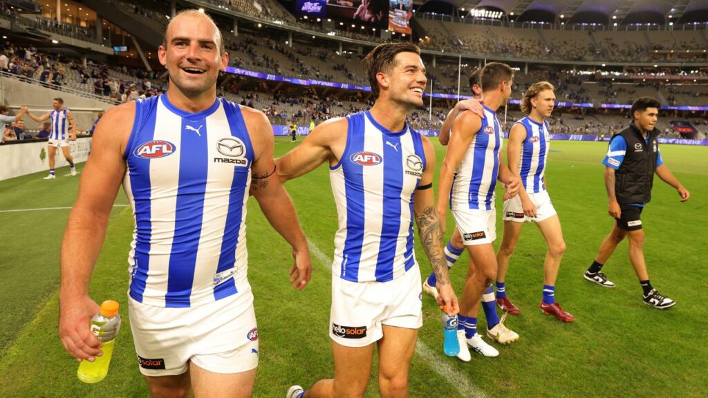North Melbourne great Ben Cunnington (l) will retire from the AFL this Saturday.

