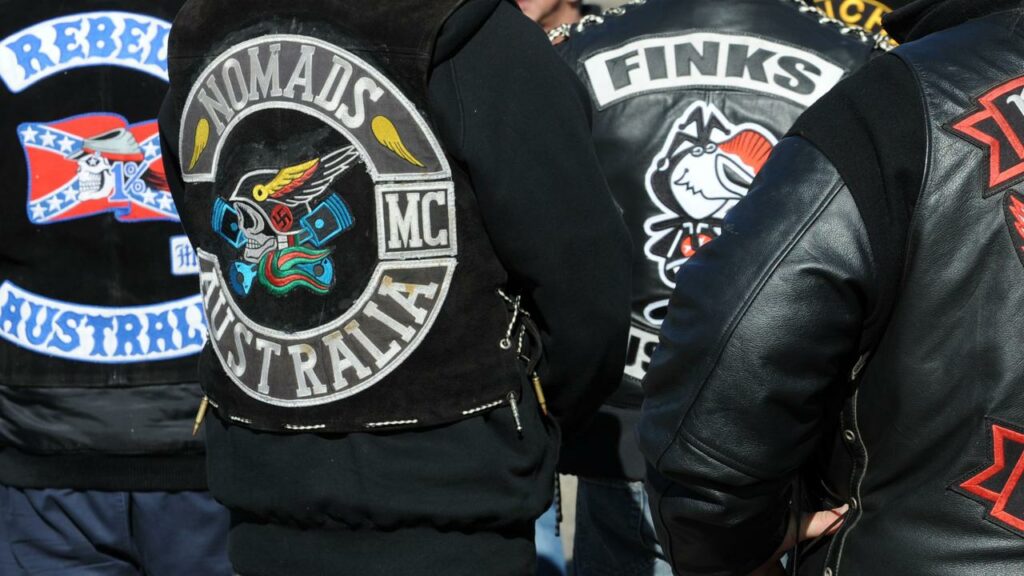 Dozens of weapons, as well as cars and cash, have been seized during a bikie gang crackdown.
