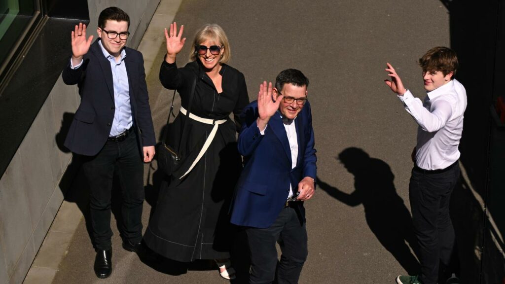 Daniel Andrews announced his resignation as premier with his wife Cath and their sons beside him.
