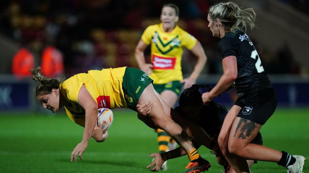 Caitlan Johnson (l) can play for Newcastle in the NRLW grand final if she pays a $400 fine.