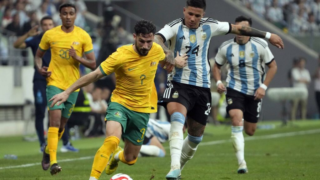 Mathew Leckie (l) has sustained an injury in Socceroos training and will be out for six weeks.
