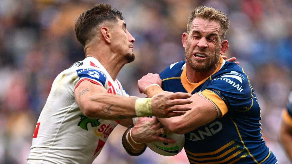 Parramatta’s Andrew Davey (r) has retired after a series of concussions.