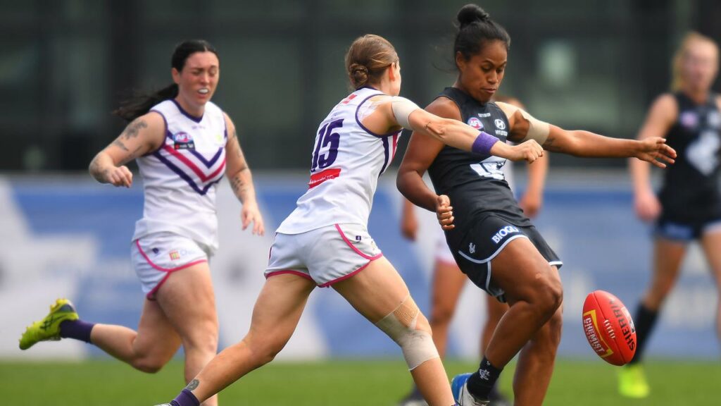 Former Carlton defender Mua Laloifi (right) has been picked up by the rebuilding Western Bulldogs.
