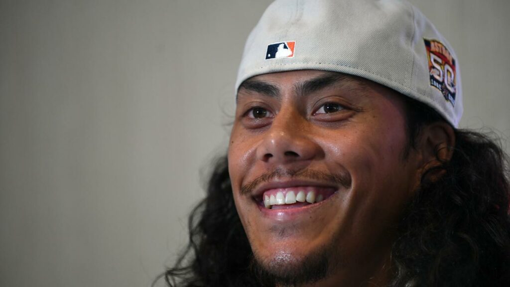 Jarome Luai is all smiles as he announces his five-year deal with Wests Tigers on Wednesday.