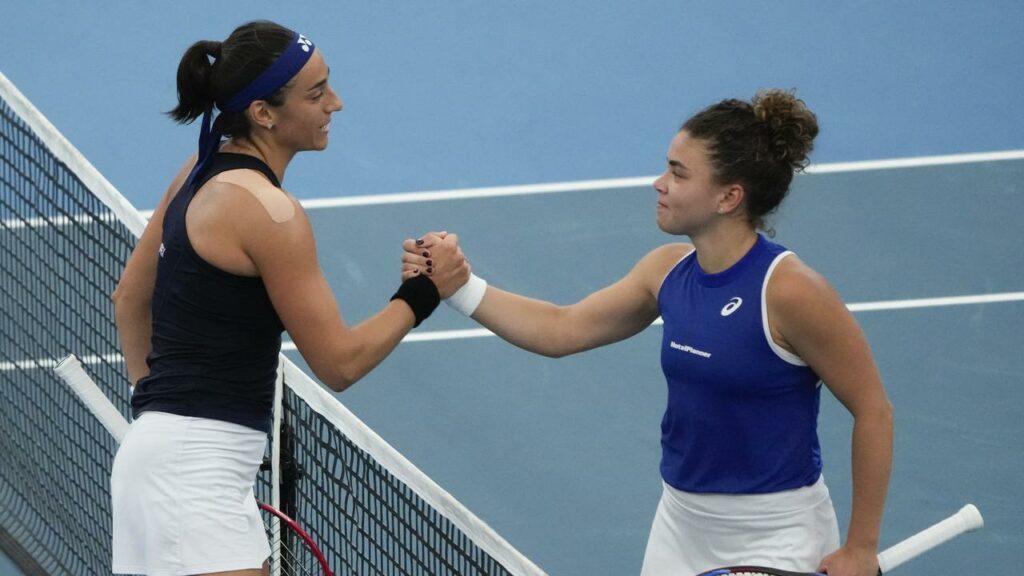 Caroline Garcia (left) beat Italy’s Jasmine Paolini to help France into the United Cup quarters.