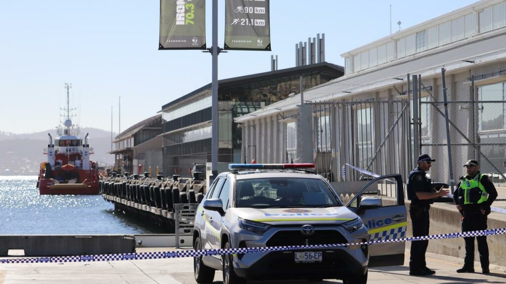 A 27-year-old man drowned at a Hobart wharf after allegedly being pushed into the water.