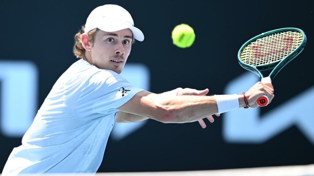 Alex de Minaur is drawn to face the dangerous Milos Raonic in the Australian Open first round.
