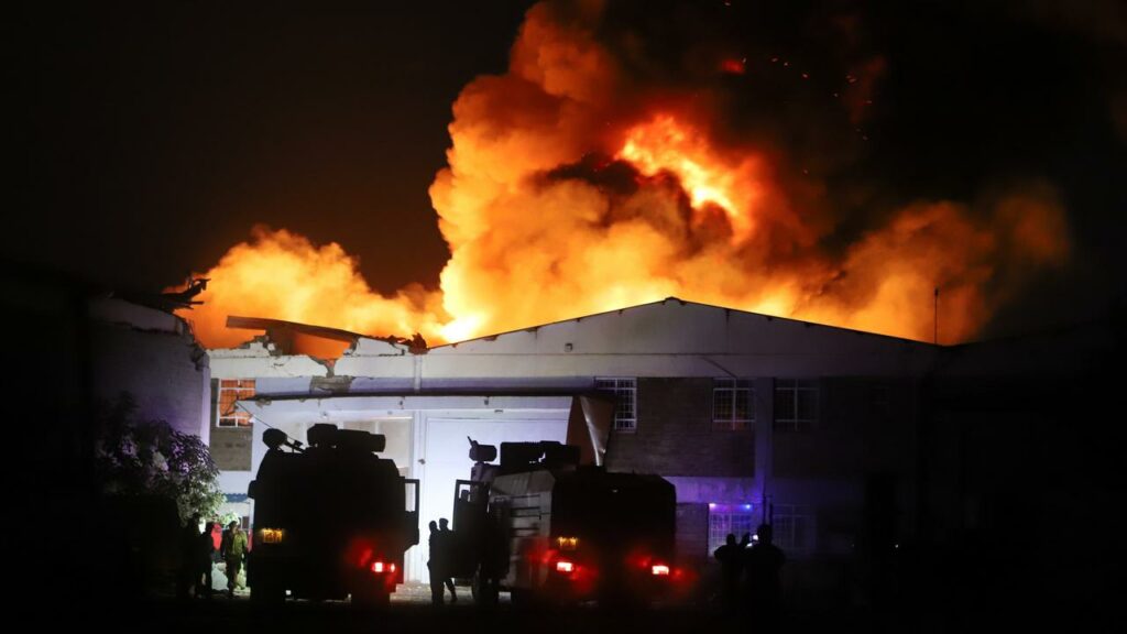 Rescuers are on the scene after an explosion and fire in Nairobi, Kenya.