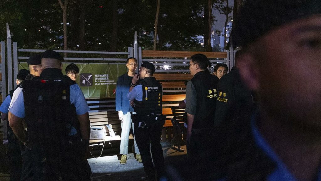 Hong Kong police officers have stopped and searched people near Victoria Park.