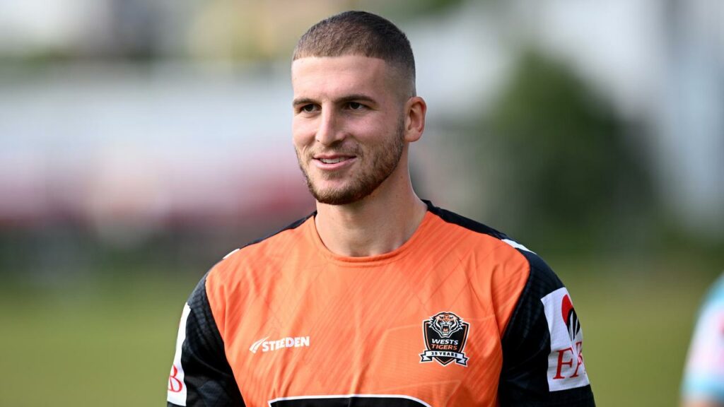 Adam Doueihi will remain in Wests Tigers colours until at least the end of next season.