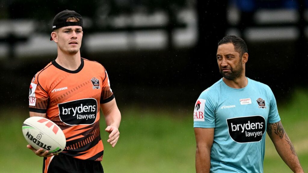 Lachlan Galvin (left) could not be happier at Wests Tigers, head coach Benji Marshall (right) says.

