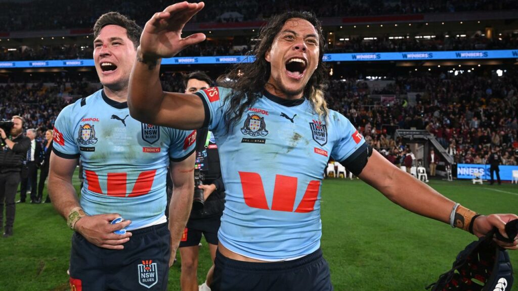 Blues’ Jarome Luai (R) and Mitchell Moses are ecstatic after their State of Origin III victory.