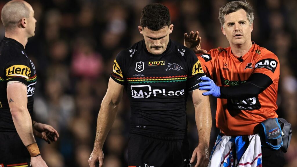 Panthers’ Nathan Cleary looks downcast as he leaves the field against Storm with a shoulder injury.