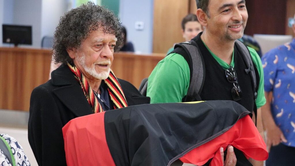 Indigenous remains and a rare necklace have been returned to Tasmania from universities in the UK.