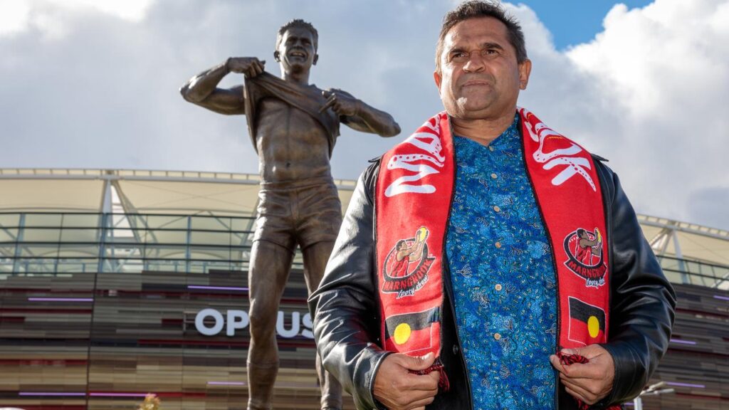 Nicky Winmar’s famous gesture against racism is memorialised in a statue outside Perth Stadium.
