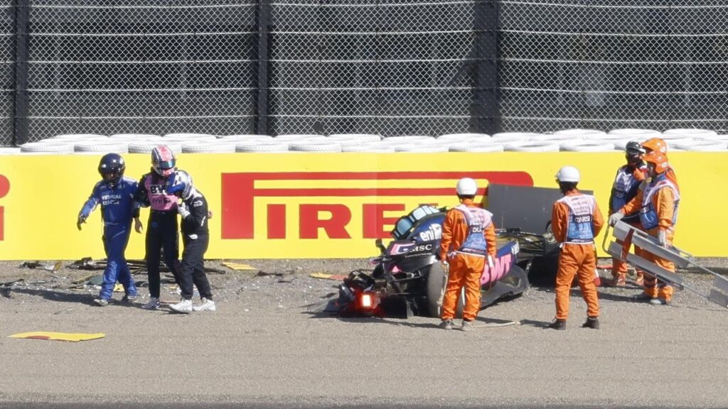 Jack Doohan gets assistance after crashing during practice ahead of the Japanese Grand Prix.
