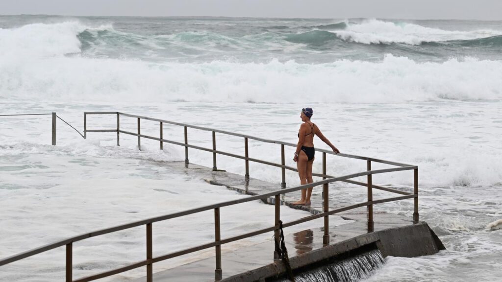 Some swimmers still braved wild conditions at ocean pools along Sydney’s beaches.