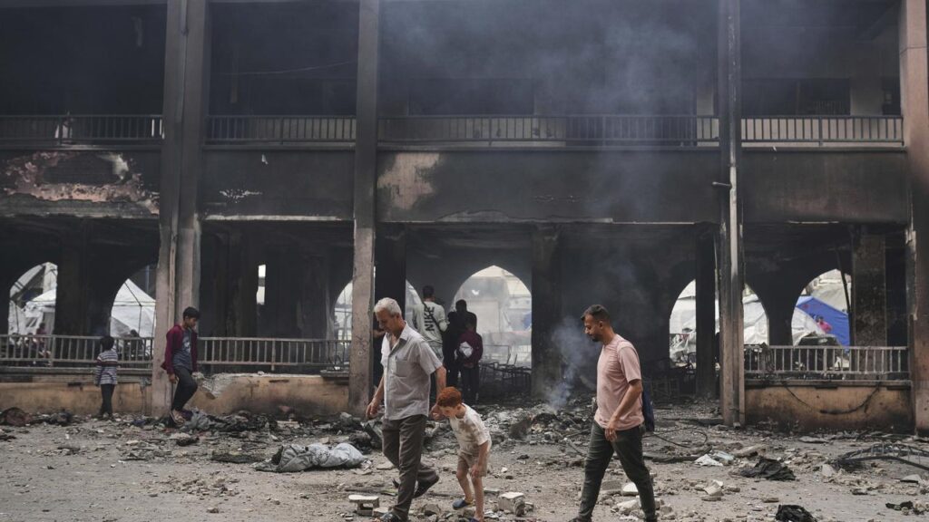At least 10 people were killed in an Israeli strike on a school sheltering families, medics say.