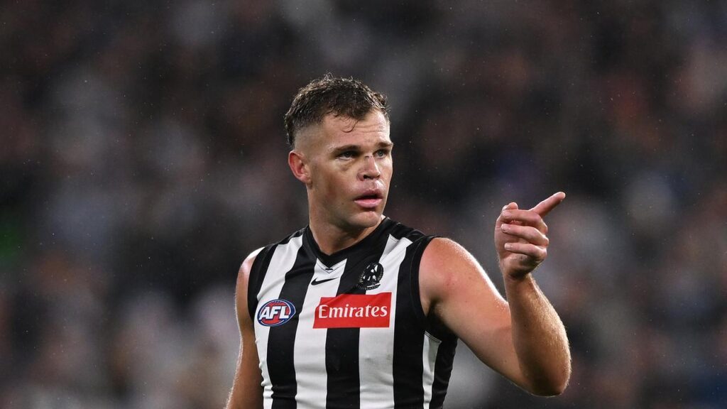 Collingwood’s Dan Houston says there was nothing untoward in his high bump on an opponent.
