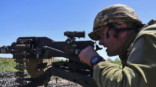 Ukrainian servicemen hold position