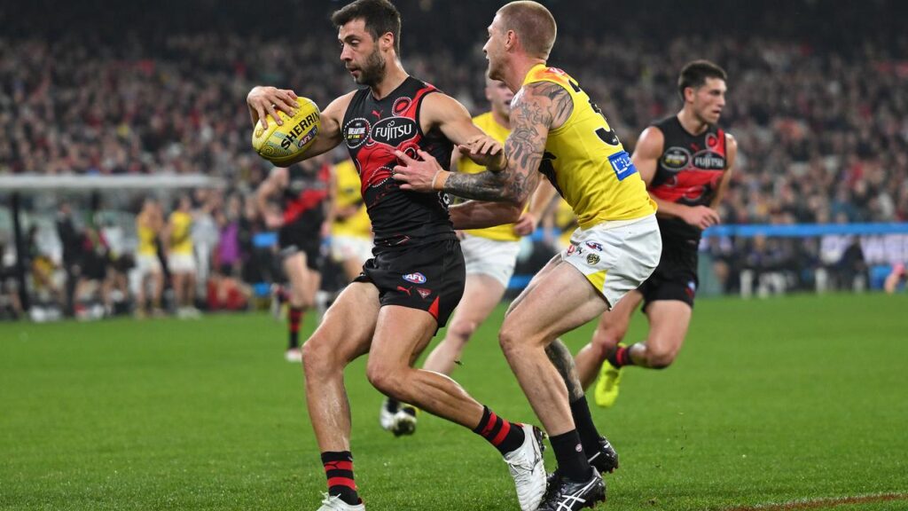 Essendon’s Kyle Langford (L) could miss a number of weeks after being injured against Richmond.