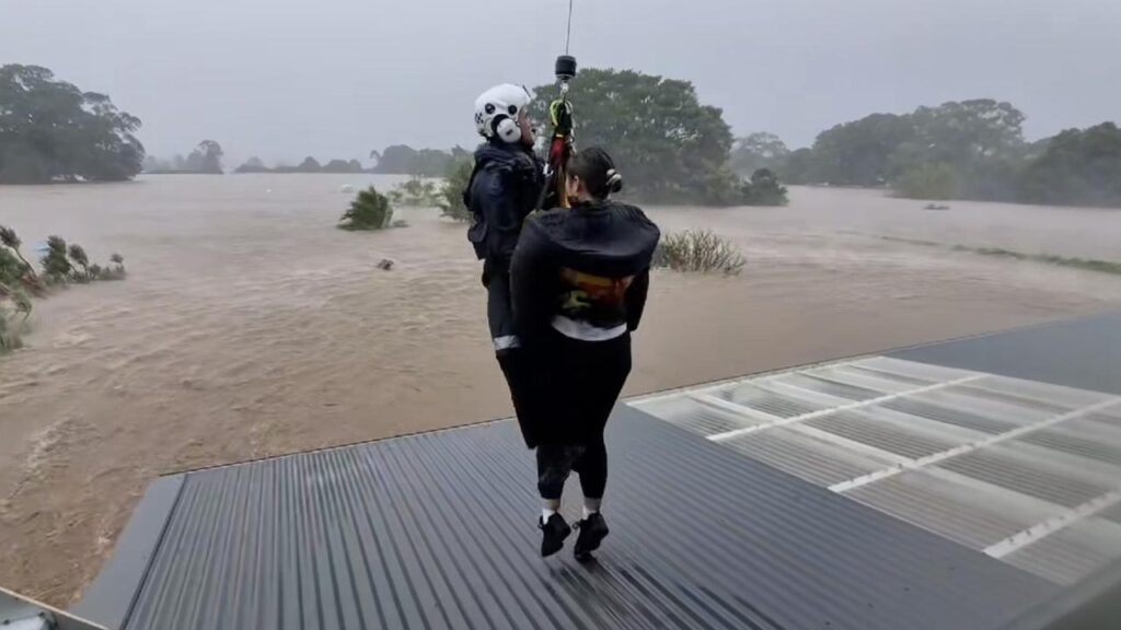 Rescue helicopters are winching people to safety from flooded properties as more rain in forecast.