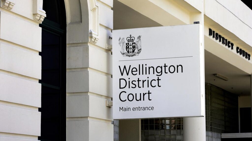 A New Zealand court has discharged the husband of an Australian diplomat who spat on a woman.