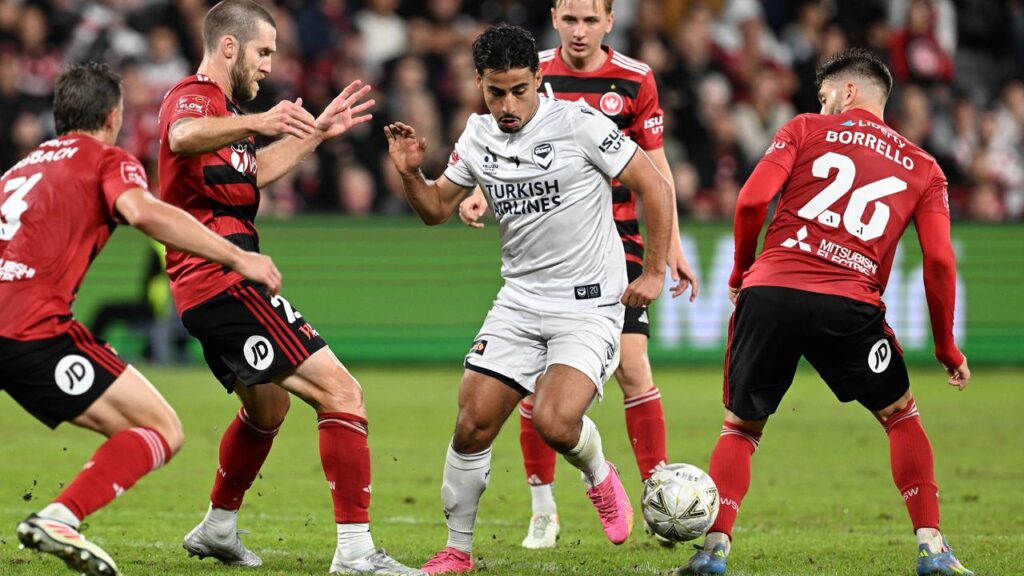 Melbourne Victory’s Daniel Arzani (centre) weaved plenty of magic against the Wanderers.