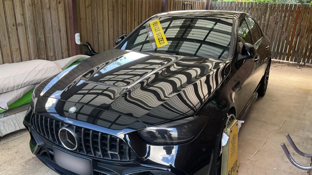 A Mercedes AMG and an SUV were seized during raids on stores selling illegal tobacco products.