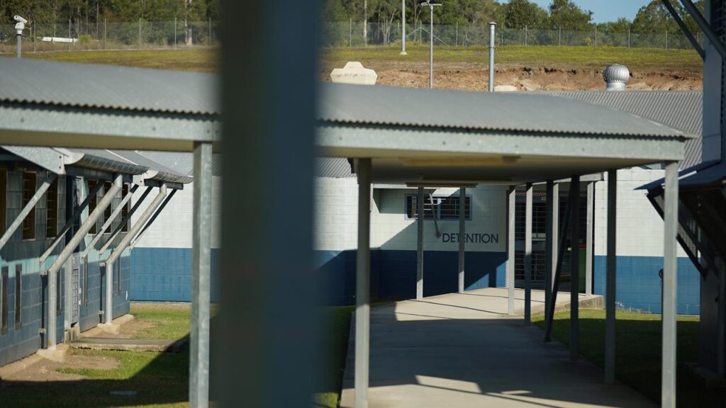 A woman accused of fatally stabbing her young child has been rushed from detention to hospital.
